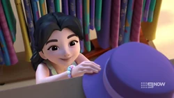 Emma finds a purple fedora.