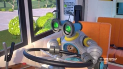 Zobo pretending to drive the bus.