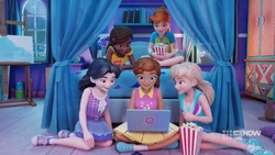 The girls watching a video feed of Carter leaving town.