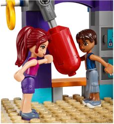 Mia and Robert at the punching bag.