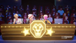 Dottie and Chloe are wondering who the mystery judge is.