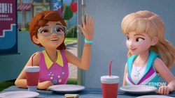 Olivia waving at friendly alien in her career daydream.