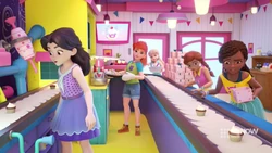 The girls are surprised when the conveyor belt stops moving.