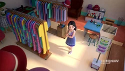Emma looking for some vintage fashion accessories for Andrea.