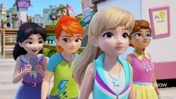 The girls see some seabirds flying inland to get away from the ocean.