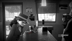 Emma finds a clue on the counter.