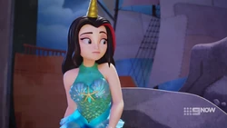 Vicky realised the lever that just moved is going to open a trapdoor under her sitting rock.