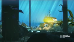 The Dredger near the boardwalk support pillars.