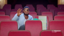 Andrea’s father waving.