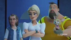 Dr Alvah and her lackeys watching the girls confront Carter.