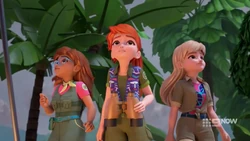 The girls are looking around at the sky.