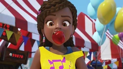 and he puts the fruit in Andrea’s mouth to stop her from talking.