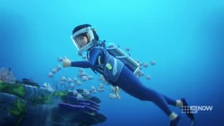 Kacey signalling to the other girls the guards are leaving the Dredger.