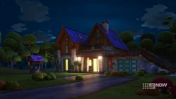 Mia’s house at night.