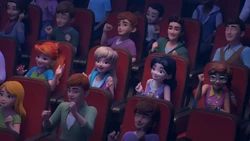 The girls, Ethan and the rest of the audience groove to Andrea's song.