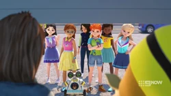 Four angry girls and one angry robot making a house call.
