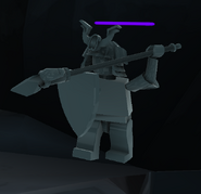 A Dark Ronin statue in-game