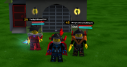 Two players wearing the Black Knight Helm in-game (this item is unnamed, the name black knight helm is found from it's .nif model file)