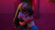 Isabela and Mirabel hug