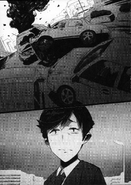 Koudai arrêté dans les bouchons à cause d'un accident de voiture.
