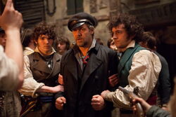 Courfeyrac, Javert, and one of the other volunteers