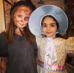 As little Cosette on the West End with Elise Blake (right)