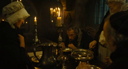 Madame Magloire along with the Bishop, Mlle Baptistine and Jean Valjean