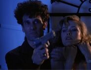 Anthony Crivello and Debra Feuer in a scene from NBC's "MIAMI VICE."