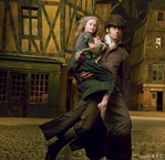 Young Cosette with Jean Valjean in the 2012 film