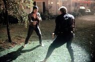 The two battle it out on Murtaugh's lawn.