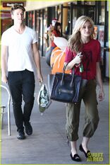 Patrick Schwarzenegger 2012 in black Levi's jeans with AJ Michalka