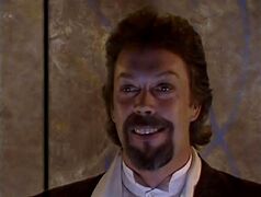 Tim Curry as Poet Man