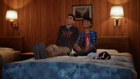Sean and Daniel watching Hawt Dawg Man on the right bed in Room 10.