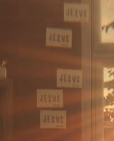 Stickers with the word Jesus in Episode 1