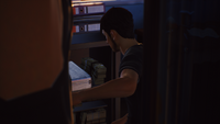 Sean placing a gun into the shop's safe. ("Wolves"; determinant)