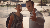 Robert gesturing towards the church while speaking with Sean. ("Faith")