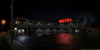 An exterior shot of Three Seals Motel.