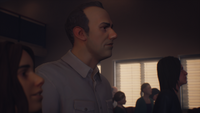 Robert listening to Lisbeth's introduction. ("Faith")