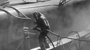 The workers decontaminating the ships.
