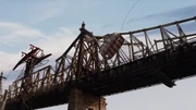 The cable of the  snaps and the tram plunge into the East River.