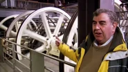 Steven S. Ross explaining the sheave room of the cable cars, including the gear wrks.
