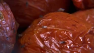 Fruit flies eating produce.