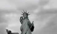 AlternativeLiberty.jpg (283 KB) The alternate arm collapse of the statue, as seen in a reel video.