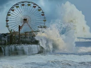 The pier is pounded by waves.