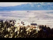 Music and announcements beam across the land of Taos, New Mexico.