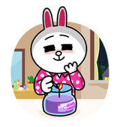 Cony lighting up a candle.