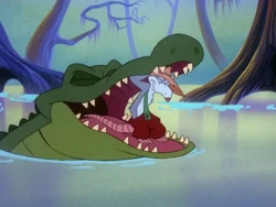 Boudreaux struggles to free himself from the alligator.