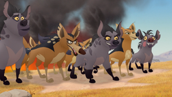 The hyenas and jackals face off against the Lion Guard, Rafiki, and Tamaa.