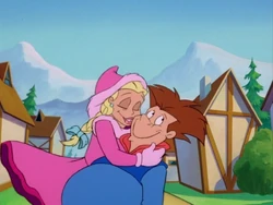 Frieda embraces Fronk after he secures his job as a timekeeper.