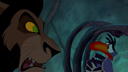 Scar chastises Zazu for his mention of Mufasa's name.